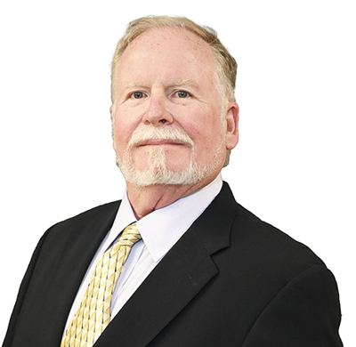 A professional photo of Alan Weakley, President and Project Manager of Strategic Storage Partners.